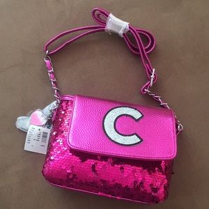 C justice purse. New with tags